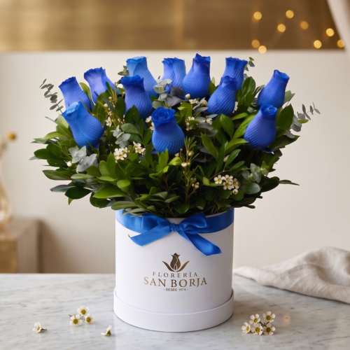 Box cilindrico con 12 rosas azules Box cilindrico con 12 rosas azules